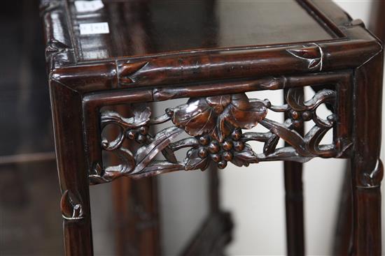 A tall Chinese rosewood stand, early 20th century, width 35cm square, height 115.5cm